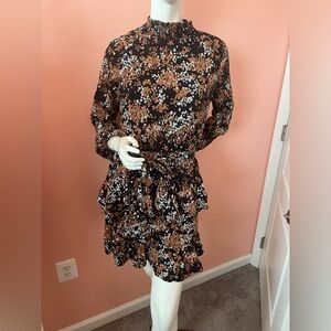 Vici Black Ruffled Dress with Tan and White Floral Pattern